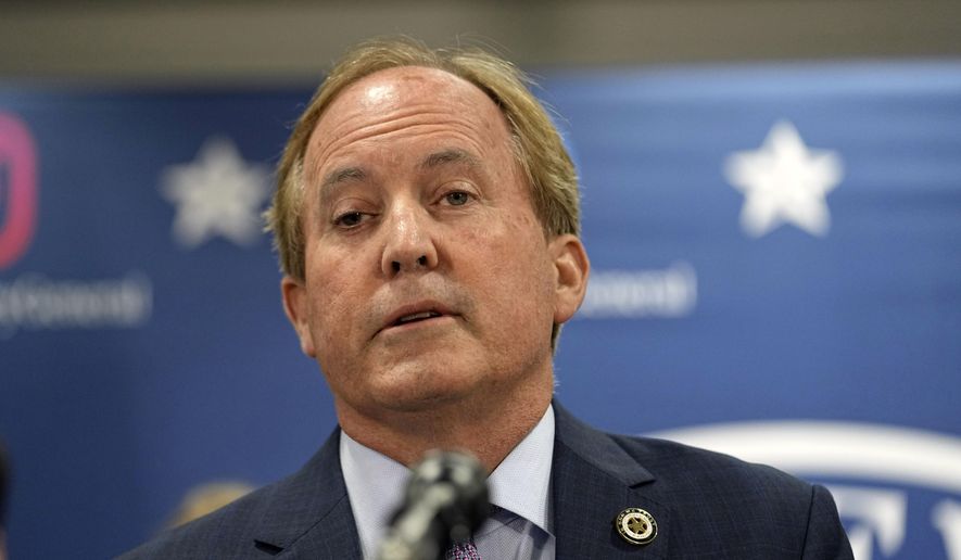 Texas state Attorney General Ken Paxton reads a statement at his office in Austin, Texas, Friday, May 26, 2023. An investigating committee says the Texas House of Representatives will vote Saturday on whether to impeach state Attorney General Ken Paxton. (AP Photo/Eric Gay)