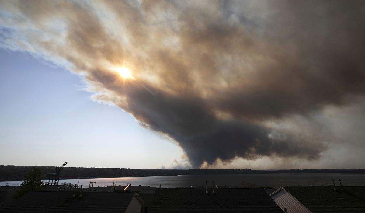 NextImg:Virginia landfill fire, Canadian wildfires cause hazy skies in D.C. area