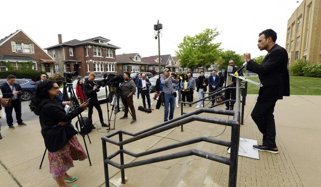 Republican Presidential candidate Vivek Ramaswamy speaks outside the shuddered former South Shore High School where the city of Chicago is planning to house illegal migrants Friday, May 19, 2023, in Chicago. (AP Photo/Paul Beaty)