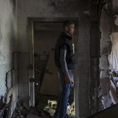 A man inspects his office damaged by a drone during a night attack, in Kyiv, Ukraine, Sunday, May 28, 2023. Ukraine&#x27;s capital was subjected to the largest drone attack since the start of Russia&#x27;s war, local officials said, as Kyiv prepared to mark the anniversary of its founding on Sunday. (AP Photo/Vasilisa Stepanenko)