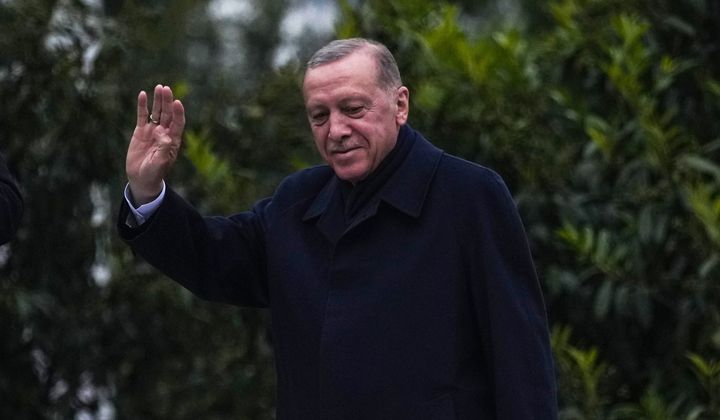 President Recep Tayyip Erdogan waves to supporters outside his residence in Istanbul, Turkey, Sunday, May 28, 2023. Turkey&#x27;s incumbent President Recep Tayyip Erdogan has declared victory in his country&#x27;s runoff election, extending his rule into a third decade. (AP Photo/Francisco Seco)