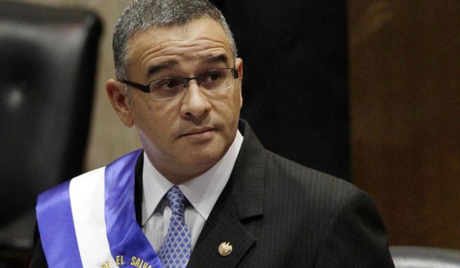 El Salvador&#x27;s President Mauricio Funes stands in the National Assembly before speaking to commemorate the anniversary of his third year in office in San Salvador, El Salvador, June 1, 2012. El Salvador&#x27;s Attorney General&#x27;s Office on Friday, May 12, 2023 asked a court to impose a 16-year prison sentence on the former president for allegedly arranging a truce with gangs to lower the homicide rate in exchange for benefits for their jail leaders. (AP Photo/Luis Romero, File)