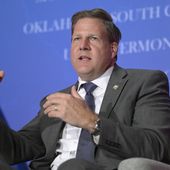 New Hampshire Gov. Chris Sununu takes part in a panel discussion during a Republican Governors Association conference on Nov. 15, 2022, in Orlando, Fla. (AP Photo/Phelan M. Ebenhack, File)