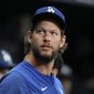 Los Angeles Dodgers starting pitcher Clayton Kershaw looks out of the dugout during the first inning of a baseball game against the Tampa Bay Rays Friday, May 26, 2023, in St. Petersburg, Fla. (AP Photo/Chris O&#x27;Meara)