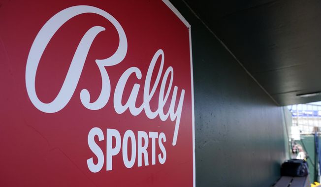 A Bally Sports logo is on a dugout wall during a spring training baseball game at Roger Dean Stadium, March 4, 2023, in Jupiter, Fla. Major League Baseball will take over broadcasts of San Diego Padres games beginning Wednesday, May 31. (AP Photo/Lynne Sladky, FIle) **FILE**