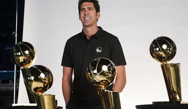 Golden State Warriors general manager Bob Myers poses for a photograph during an NBA basketball media day in San Francisco, Sunday, Sept. 25, 2022. Myers is departing as president and general manager of the Warriors after building a championship team that captured four titles in an eight-year span and reached five straight NBA Finals from 2015-19. (AP Photo/Godofredo A. Vásquez, File)
