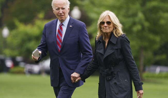 President Joe Biden and first lady Jill Biden arrive on the South Lawn of the White House, Tuesday, May 30, 2023, in Washington. (AP Photo/Evan Vucci)