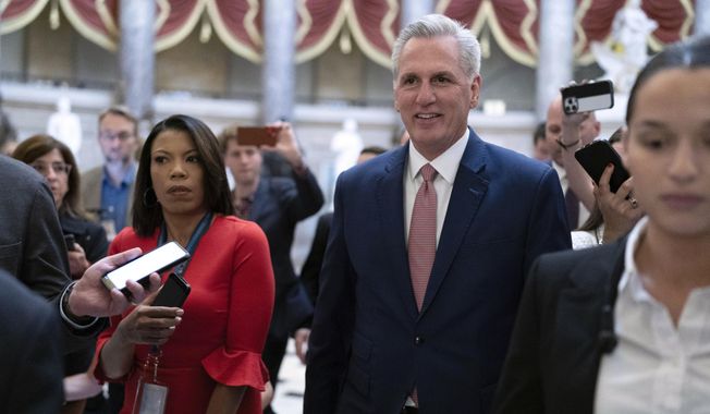 Speaker of the House Kevin McCarthy, R-Calif., walks to the House chamber at Capitol Hill, Tuesday, May 30, 2023, in Washington. (AP Photo/Jose Luis Magana)