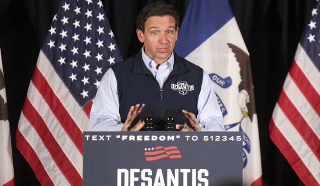 Florida Gov. Ron DeSantis speaks to voters at a rally in Council Bluffs, Iowa, Wednesday. Several hundred people filled half of an event center to listen to DeSantis speak in his first trip to Iowa since announcing his presidential campaign. (AP Photo/Josh Funk)