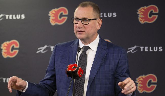 Calgary Flames general manager Brad Treliving announces the resignation of head coach Bill Peters at an NHL hockey press conference in Calgary, Alberta, Friday, Nov. 29, 2019. Treliving is the new general manager of the Toronto Maple Leafs. The team made the announcement Wednesday, May 31, 2023, less than two weeks after firing Kyle Dubas. (Larry MacDougal/The Canadian Press via AP) **FILE**