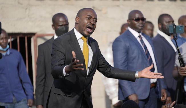 Zimbabwe opposition leader Nelson Chamisa addresses speaks at the funeral of Moreblessing Ali in Nyatsime a neighborhood on the outskirts of Harare, Tuesday, June, 14, 2022. Zimbabwe President Emmerson Mnangagwa has announced that national elections will take place on Aug. 23. Mnangagwa is expected to face a strong challenge from Nelson Chamisa, the 45-year-old leader of the main opposition party, Citizens Coalition for Change. (AP Photo/Tsvangirayi Mukwazhi, File)