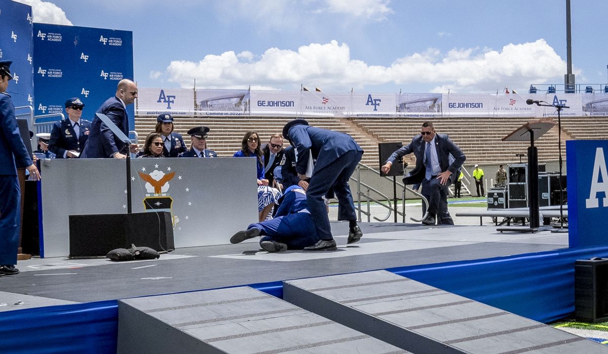 NextImg:Biden falls at Air Force Academy commencement ceremony