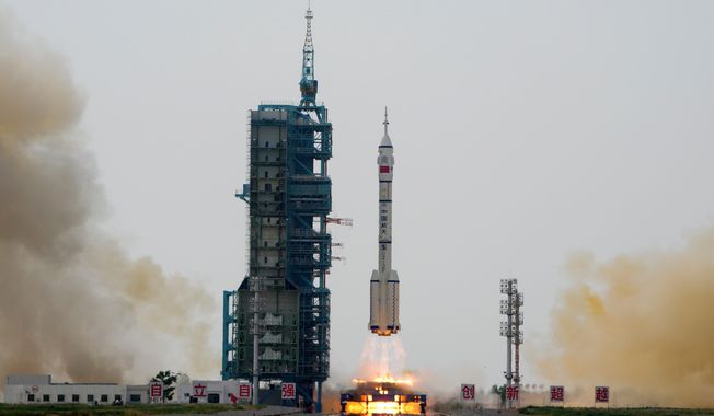 A Long March rocket carrying a crew of Chinese astronauts in a Shenzhou-16 spaceship lifts off at the Jiuquan Satellite Launch Center in northwestern China on Tuesday, May 30, 2023. (AP Photo/Mark Schiefelbein) **FILE**