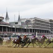 Javier Castellano, atop Mage, third from left, is seen behind with others behind the pack as they make the first turn while competing in the 149th running of the Kentucky Derby horse race at Churchill Downs Saturday, May 6, 2023, in Louisville, Ky. Churchill Downs will limit horses to four starts during a rolling eight-week period and impose ineligibility standards for continued poor performance in the wake of the recent deaths of 12 horses at the home of the Kentucky Derby. (AP Photo/Julio Cortez) **FILE**
