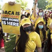 Susana Lujano, left, a dreamer from Mexico who lives in Houston, joins other activists to rally in support of the Deferred Action for Childhood Arrivals program, also known as DACA, at the U.S. Capitol in Washington, June 15, 2022. (AP Photo/J. Scott Applewhite, File)
