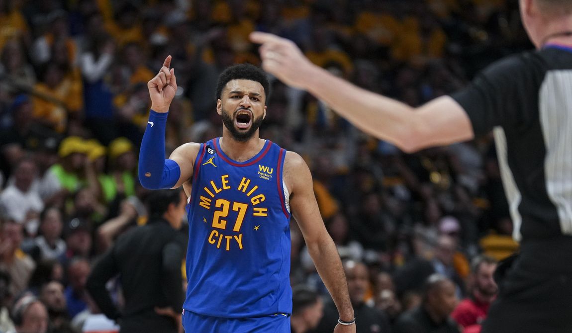 Denver Nuggets guard Jamal Murray reacts during the second half of Game 1 of the basketball team&#x27;ss NBA Finals against the Miami Heat, Thursday, June 1, 2023, in Denver. (AP Photo/Jack Dempsey)