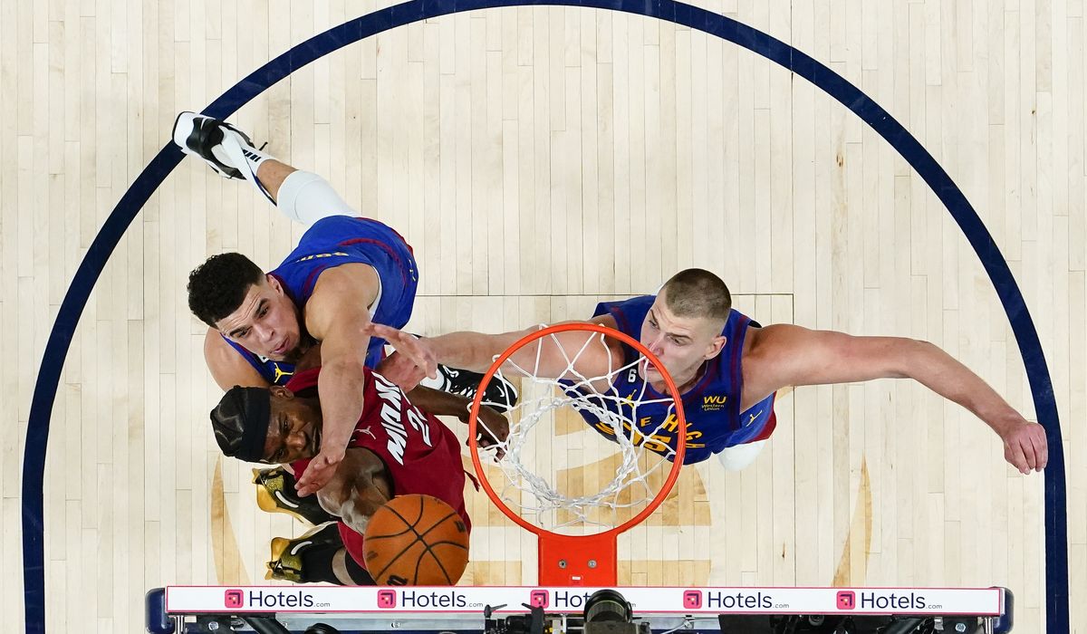 NextImg:Jokic gets triple-double, Nuggets roll past Heat 104-93 in Game 1 of NBA Finals