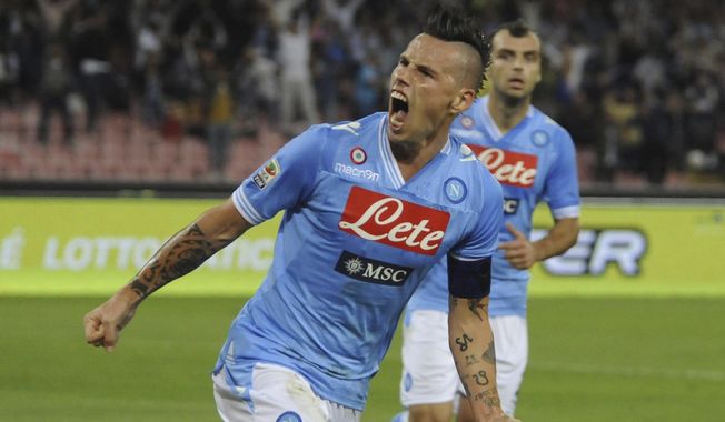Napoli&#x27;s Marek Hamsik, of Slovakia, celebrates after scoring during a Serie A soccer match between Napoli and Udinese, at the Napoli San Paolo stadium, Italy, Sunday, Oct. 7, 2012. Former Slovakia and Napoli captain Marek Hamšík announced on Thursday, June 1, 2023, he is retiring from soccer at the end of the season. (AP Photo/Salvatore Laporta, File)