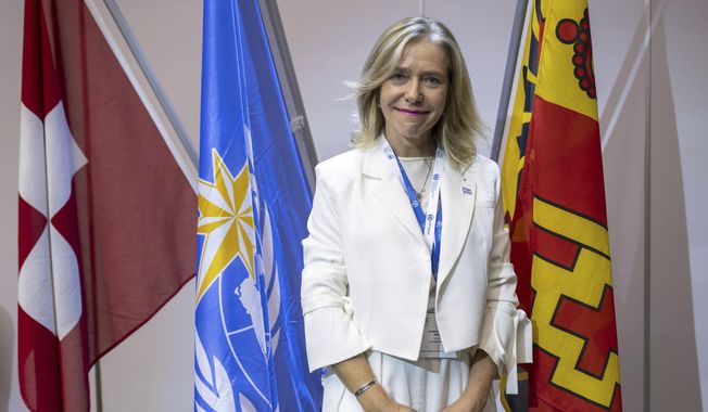 Argentina&#x27;s Celeste Saulo poses after she was elected as Secretary-general of the World Meteorological Organization (WMO) in Geneva, Switzerland, Thursday, June 01, 2023 during the UN climate and weather agency&#x27;s congress in Geneva. Saulo has served as the director of Argentina’s National Meteorological Service since 2014. (Martial Trezzini/Keystone via AP)