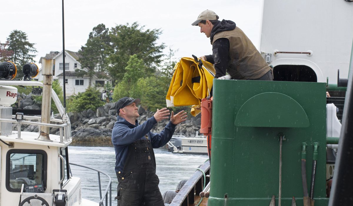 NextImg:Authorities recover bodies of 2 sisters after vessel found submerged in Alaska; 2 still missing