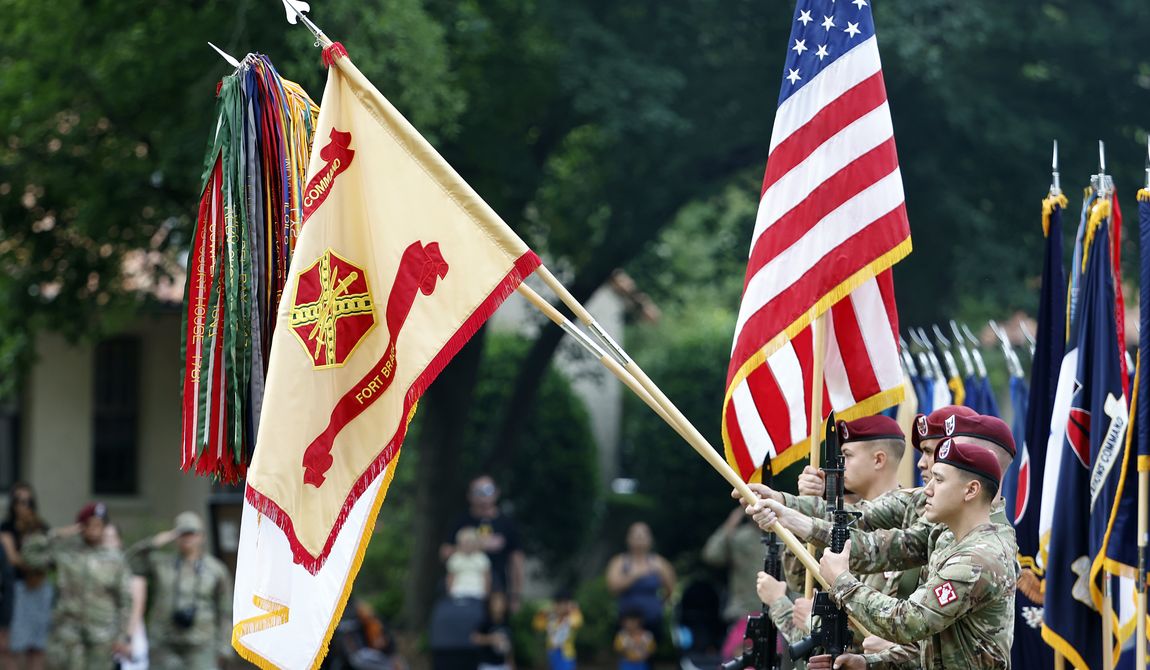 An honor guard displays the colors of Fort Bragg as a part of the ceremony to rename Fort Bragg, Friday, June 2, 2023 in Fort Liberty, N.C. The U.S. Army changed Fort Bragg to Fort Liberty as part of a broader initiative to remove Confederate names from bases. (AP Photo/Karl B DeBlaker)