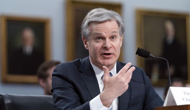 FBI Director Christopher Wray testifies before the House Appropriations subcommittee Commerce, Justice, Science, and Related Agencies budget hearing for Fiscal Year 2024, on Capitol Hill in Washington, April 27, 2023. The FBI has offered to show top lawmakers next week a bureau document that purports to relate to President Joe Biden and his family following weeks of demands by congressional Republicans and a contempt threat against Director Christopher Wray. (AP Photo/Jose Luis Magana, File)