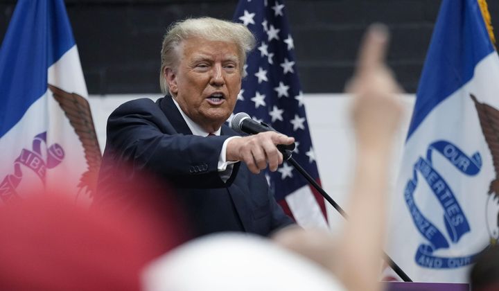 Former President Donald Trump visits with campaign volunteers at the Grimes Community Complex Park, Thursday, June 1, 2023, in Des Moines, Iowa. (AP Photo/Charlie Neibergall)