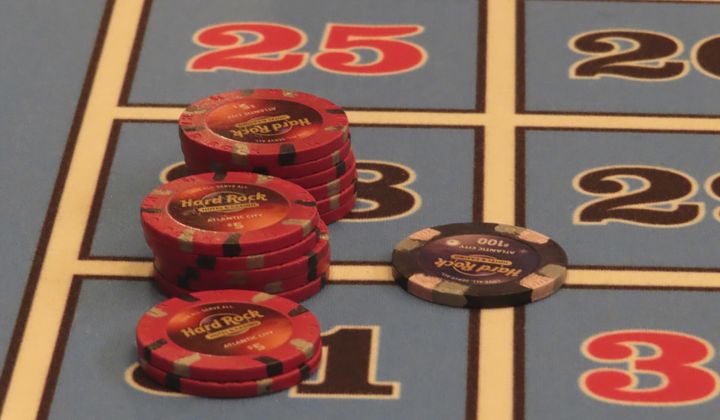 Chips sit on a roulette table at the Hard Rock casino in Atlantic City N.J., on May 17, 2023. With large numbers of high school students saying they are already gambling with friends or online before they are old enough to do so legally, several states are moving to require classes on the risks of gambling as part of high school curriculum. (AP Photo/Wayne Parry)
