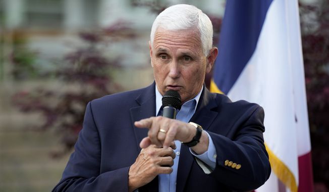 Former Vice President Mike Pence speaks to local residents during a meet and greet, May 23, 2023, in Des Moines, Iowa. The Department of Justice has informed former Vice President Mike Pence’s legal team that it won&#x27;t  pursue criminal charges related to the discovery of classified documents at his Indiana home.  (AP Photo/Charlie Neibergall, File)