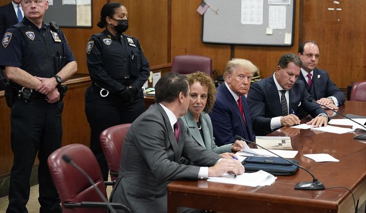 Former President Donald Trump sits at the defense table with his legal team in a Manhattan court, Tuesday, April 4, 2023, in New York. Trump&#x27;s lawyers are demanding that the judge in his New York City criminal case step aside, echoing the former president&#x27;s complaints that he&#x27;s &quot;a Trump hating-judge&quot; with a family full of &quot;Trump haters.&quot; Trump&#x27;s lawyers said June 2, that Judge Juan Manuel Merchan has shown anti-Trump bias in previous cases related to the businessman-turned-politician. (AP Photo/Seth Wenig, Pool)