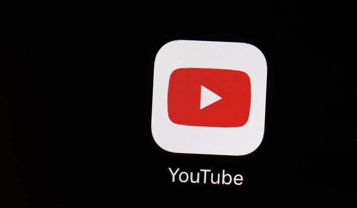 The YouTube app is displayed on an iPad on March 20, 2018, in Baltimore. YouTube will stop removing content that falsely claims the 2020 election or other past U.S. presidential elections were marred by “widespread fraud, errors or glitches,&quot; the platform announced Friday, June 2, 2023. (AP Photo/Patrick Semansky, File)