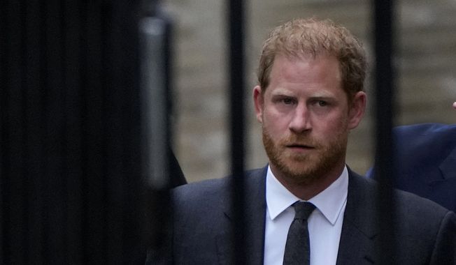 Britain&#x27;s Prince Harry arrives at the Royal Courts Of Justice in London, Tuesday, March 28, 2023. The Duke of Sussex is scheduled to testify in the High Court after his lawyer presents opening statements Monday, June 5, 2023 in his case alleging phone hacking. It’s the first of Harry’s several legal cases against the media to go to trial and one of three alleging tabloid publishers unlawfully snooped on him. (AP Photo/Alastair Grant, File)