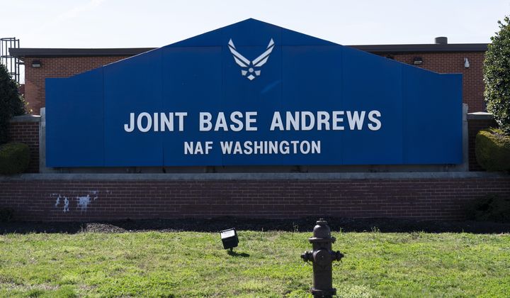 The sign for Joint Base Andrews is seen on March 26, 2021, at Andrews Air Force Base, Md. A wayward and unresponsive business jet that flew over the nation&#x27;s capital Sunday afternoon, June 4, 2023, caused the military to scramble a fighter plane from Joint Base Andrews before the jet crashed in Virginia, officials said. The fighter jet caused a loud sonic boom that was heard across the capital region. (AP Photo/Alex Brandon, File)