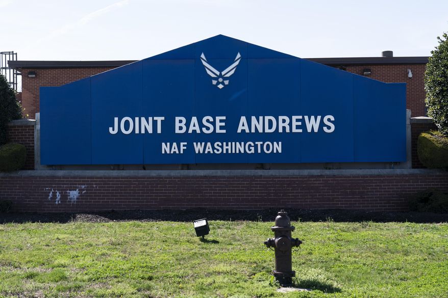 The sign for Joint Base Andrews is seen on March 26, 2021, at Andrews Air Force Base, Md. A wayward and unresponsive business jet that flew over the nation's capital Sunday afternoon, June 4, 2023, caused the military to scramble a fighter plane from Joint Base Andrews before the jet crashed in Virginia, officials said. The fighter jet caused a loud sonic boom that was heard across the capital region. (AP Photo/Alex Brandon, File)