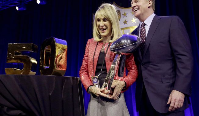 FILE - NFL Commissioner Roger Goodell poses with Norma Hunt, the widow of longtime Kansas City Chiefs owner Lamar Hunt, after a news conference, Friday, Feb. 5, 2016, in San Francisco. In a statement released by the Chiefs, Sunday, June 4, 2023, Hunt, the second wife of the late Kansas City Chiefs founder Lamar Hunt and the only woman to attend every Super Bowl, has died. She was 85. (AP Photo/Charlie Riedel, File)