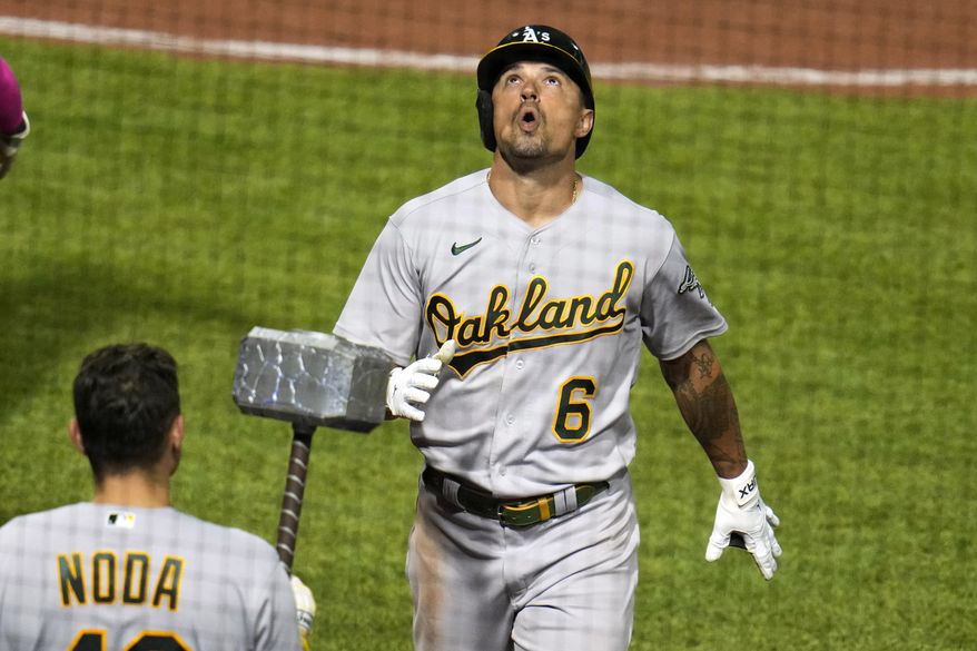 Oakland Athletics' Jace Peterson (6) returns to the dugout after hitting a two-run home run off Pittsburgh Pirates relief pitcher Chase De Jong during the eighth inning of a baseball game in Pittsburgh, Tuesday, June 6, 2023. (AP Photo/Gene J. Puskar)