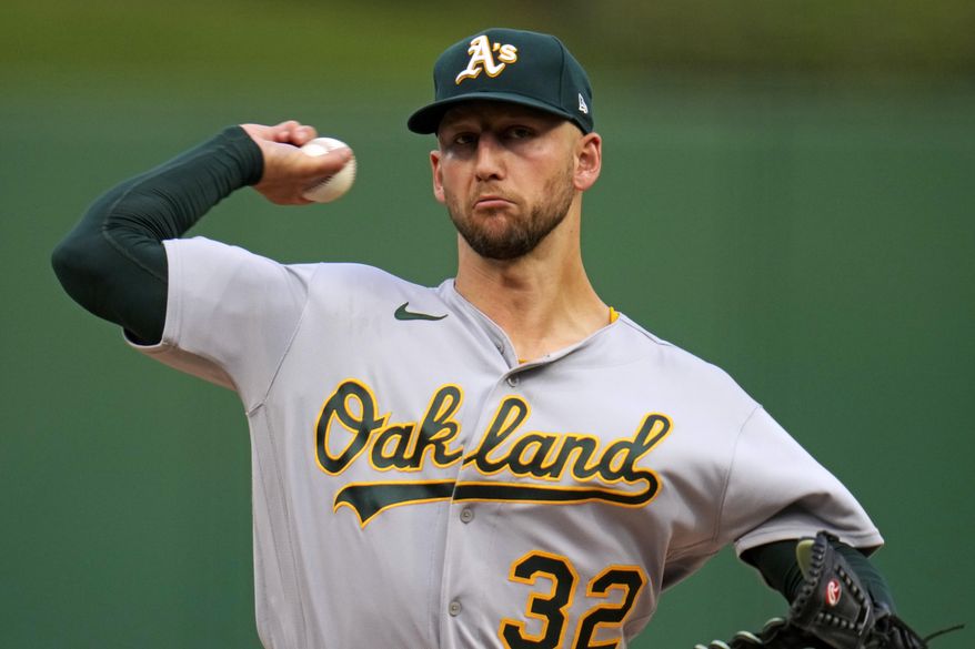 Oakland Athletics starting pitcher James Kaprielian delivers during the second inning of a baseball game against the Pittsburgh Pirates in Pittsburgh, Tuesday, June 6, 2023. (AP Photo/Gene J. Puskar)
