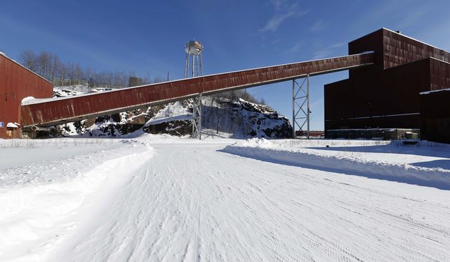 A former iron ore processing plant near Hoyt Lakes, Minn., that would become part of a proposed PolyMet copper-nickel mine, is pictured on Feb. 10, 2016. The U.S. Army Corps of Engineers said Tuesday, June 6, 2023, it has revoked a crucial federal permit for the proposed NewRange Copper Nickel mine, previously known as PolyMet, in northeastern Minnesota, saying the permit did not comply with the water quality standards set by a sovereign downstream tribe. (AP Photo/Jim Mone, File)