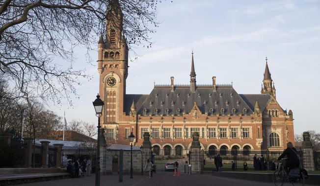 This file photo shows an exterior view of the Peace Palace, which houses the International Court of Justice, or World Court, in The Hague, Netherlands on Feb. 18, 2019. Hearings open Tuesday, June 6, 2023, at the United Nations’ highest court in a case brought by Ukraine against Russia linked to Moscow’s 2014 annexation of Crimea and arming of rebels in eastern Ukraine in the years before Russia’s full-scale invasion in February 2022. (AP Photo/Peter Dejong) **FILE**