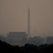 Haze blankets over monuments on the National Mall in Washington, Wednesday, June 7, 2023, as seen from Arlington, Va. Smoke from Canadian wildfires is pouring into the U.S. East Coast and Midwest and covering the capitals of both nations in an unhealthy haze. (AP Photo/Julio Cortez)