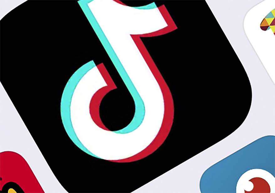 This file photo, shows the icon for TikTok in New York on Feb. 25, 2020. A former executive at ByteDance, the Chinese company which owns popular short-video app TikTok says in a legal filing that some members of the ruling Communist Party used data held by the company to identify and locate protesters in Hong Kong.(AP Photo/File)