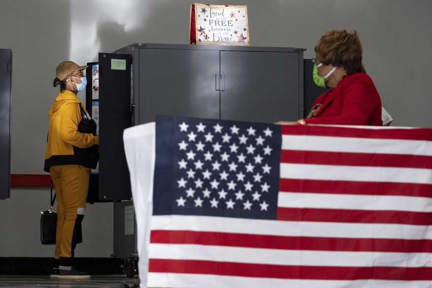 A voter marks her ballot during the first day of early voting in Atlanta on Oct. 17, 2022. Elected leaders in Georgia's most populous county — a Democratic stronghold — on Wednesday, June 7, 2023, rejected a Republican nominee for the county elections board who had challenged the eligibility of thousands of voters. (AP Photo/Ben Gray) **FILE**