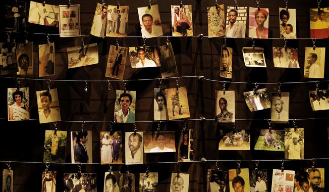 Family photographs of some of those who died hang on display in an exhibition at the Kigali Genocide Memorial Center in the capital Kigali, Rwanda, Friday, April 5, 2019. United Nations judges have on Wednesday, June 7, 2023, declared Felicien Kabuga, an elderly Rwandan genocide suspect, unfit to continue to stand trial because he has dementia and will establish a procedure to continue to hear evidence without the possibility of convicting him. (AP Photo/Ben Curtis, File)