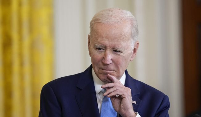 President Joe Biden listens during a news conference with British Prime Minister Rishi Sunak in the East Room of the White House in Washington, Thursday, June 8, 2023. (AP Photo/Susan Walsh)
