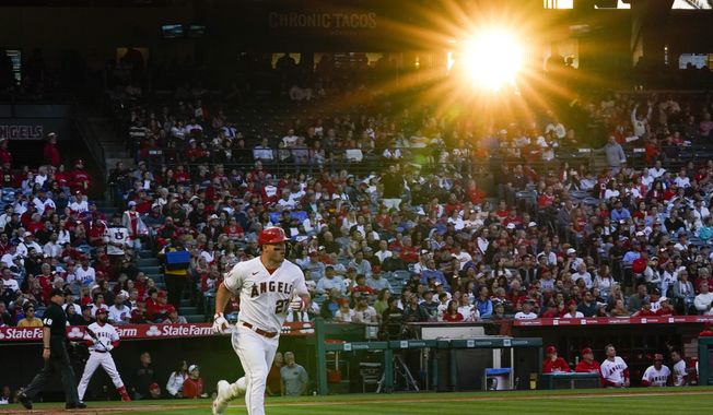 Los Angeles Angels&#x27; Mike Trout (27) runs the bases after hitting a home run during the fourth inning of a baseball game against the Chicago Cubs in Anaheim, Calif., Wednesday, June 7, 2023. (AP Photo/Ashley Landis)