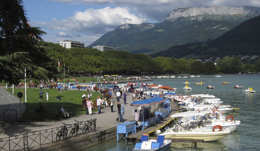 View of Annecy, French Alps, Friday, Sept.10, 2010. France&#x27;s interior minister Gerald Darmanin says Thursday, June 8, 2023, that an attacker with a knife injured children and others in a town in Annecy, French Alps. In a short tweet, he said police have detained the attacker (AP Photo/Lionel Cironneau, File)