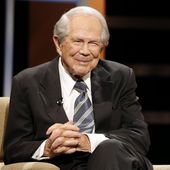 The Rev. Pat Robertson poses a question to a Republican presidential candidate during a forum at Regent University in Virginia Beach, Va., Oct. 23, 2015. Robertson, a religious broadcaster who turned a tiny Virginia station into the global Christian Broadcasting Network, tried a run for president and helped make religion central to Republican Party politics in America through his Christian Coalition, has died. He was 93. Robertson&#x27;s death Thursday, June 8, 2023, was announced by his broadcasting network. (AP Photo/Steve Helber, File)