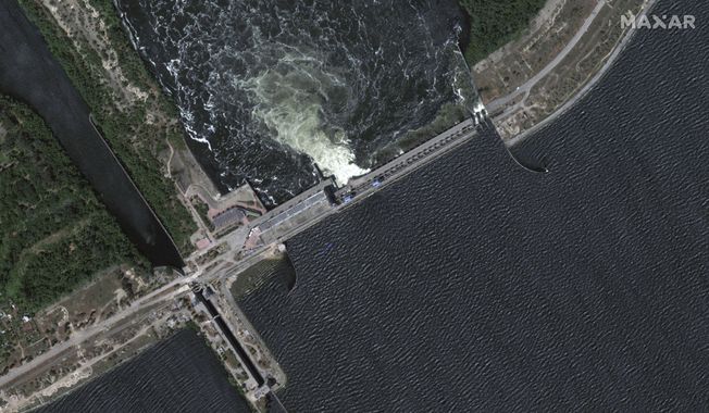 This image provided by Maxar Technologies, shows Kakhovka dam and station, Ukraine before collapse, on June 5, 2023. (Satellite image ©2023 Maxar Technologies via AP)