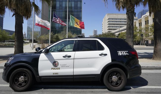 A Los Angeles Police Department vehicle is parked outside the LAPD headquarters in downtown Los Angeles on July 8, 2022. (AP Photo/Damian Dovarganes) **FILE**
