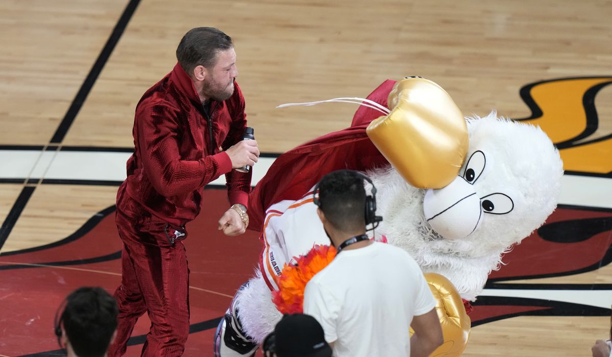 NextImg:Conor McGregor knocks out Heat mascot in bizarre promotion at NBA Finals